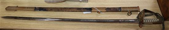 An early 20th century naval officers dress sword length 95cm